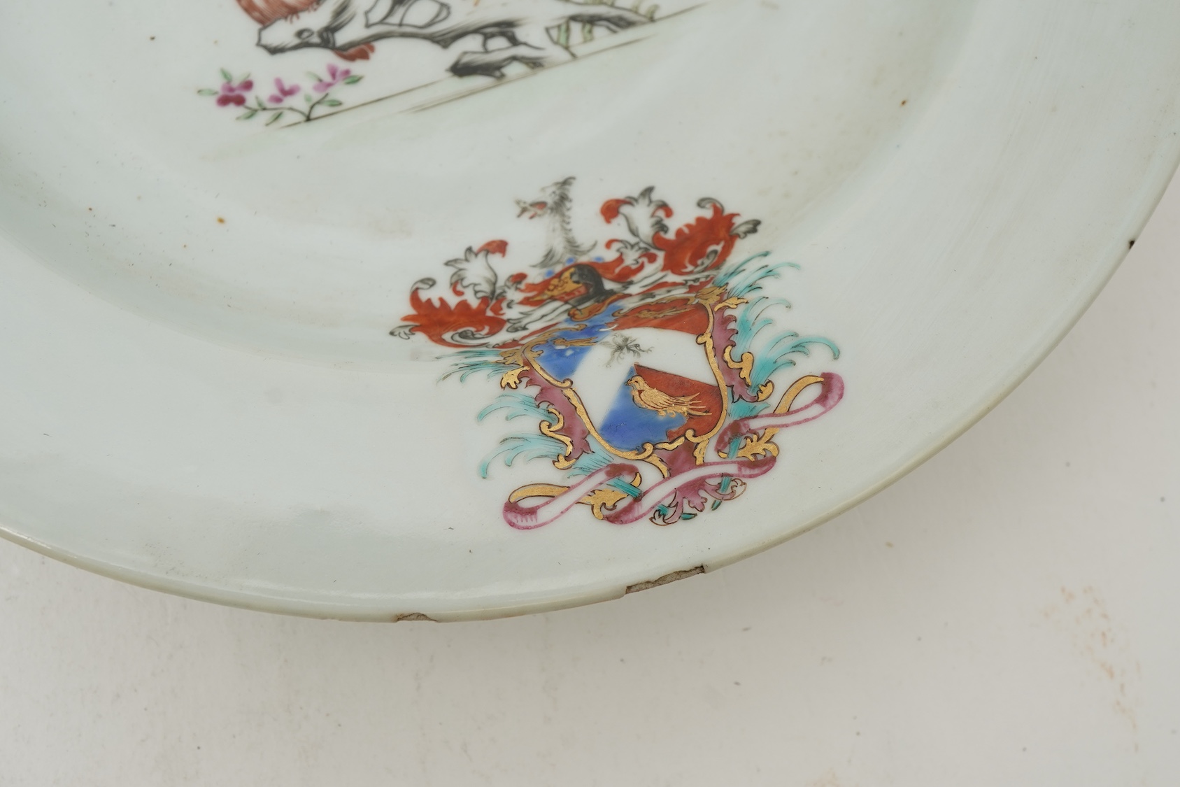 A pair of Chinese famille armorial plates, Qianlong, c.1750